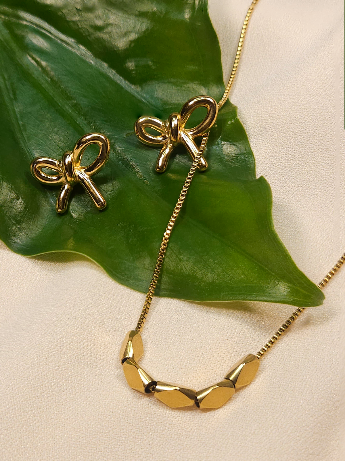 Set LAZO - Juego de Collar y Aretes Moño Acero Inoxidable Chapa Oro 18k